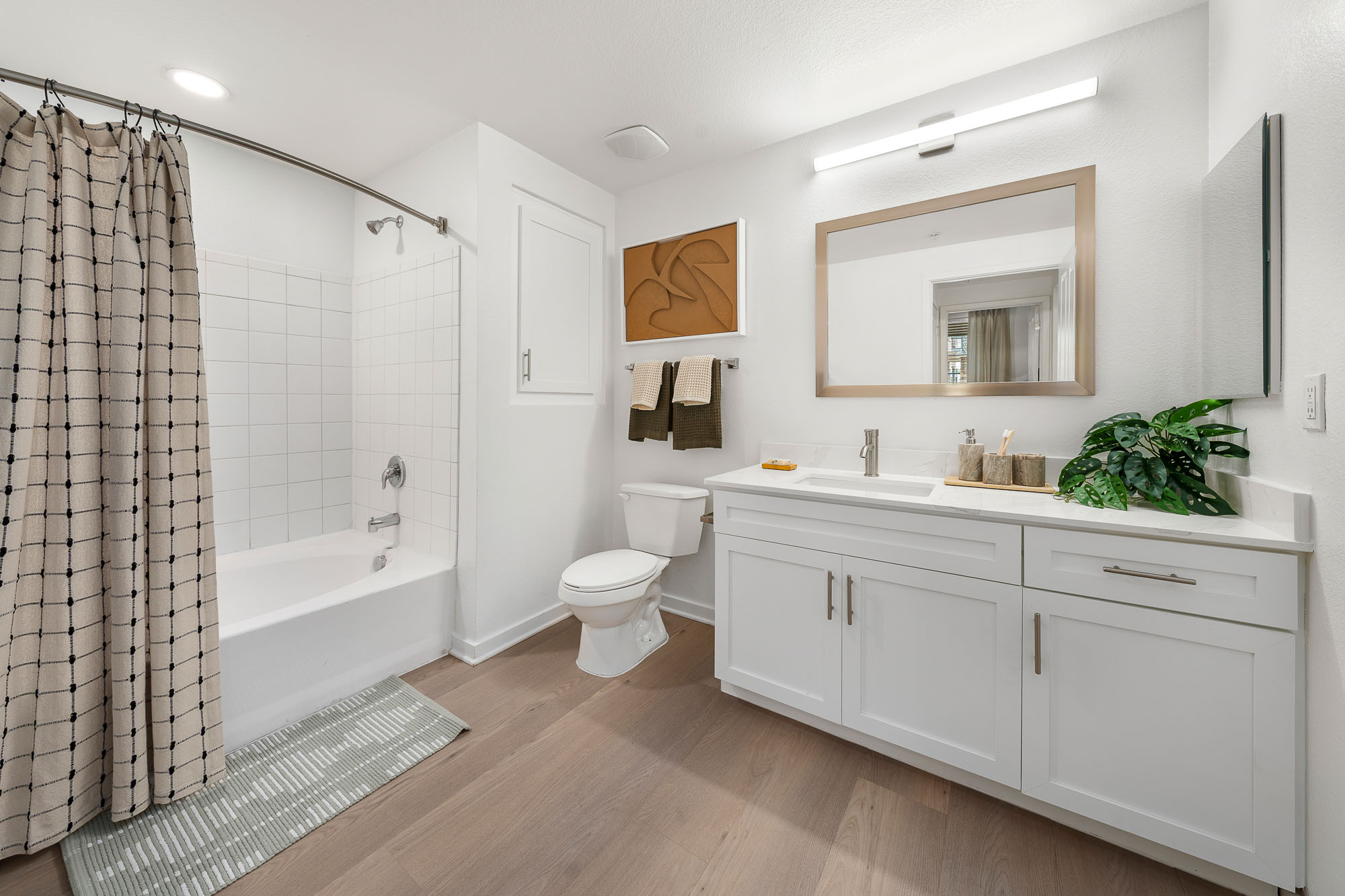 Bathroom With Double Vanity and Soaking Tub